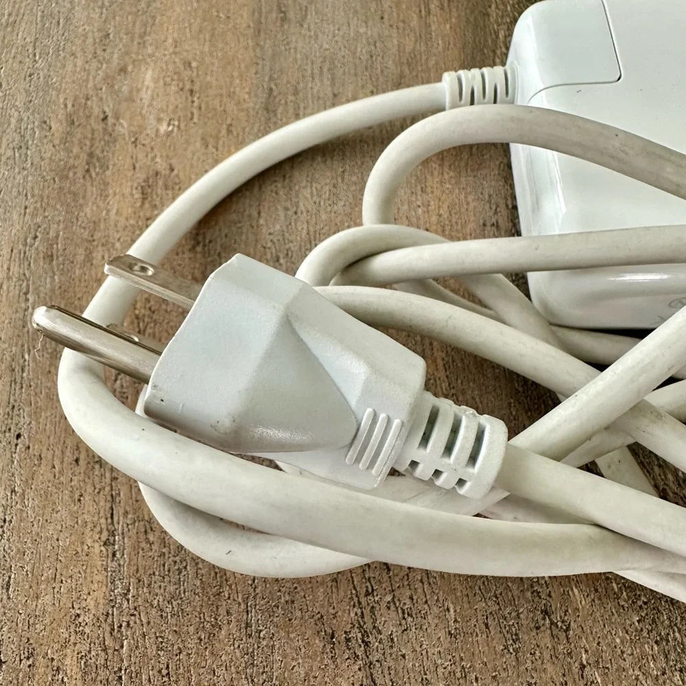 Apple MacBook White Charging Adapter.
